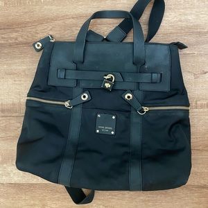 Henri Bendel Jetsetter Convertible backpack / crossbody bag W/ Gold hardware.